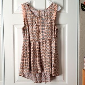 Cute loose sleeveless blouse